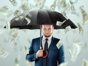 man holding umbrella while it's raning money